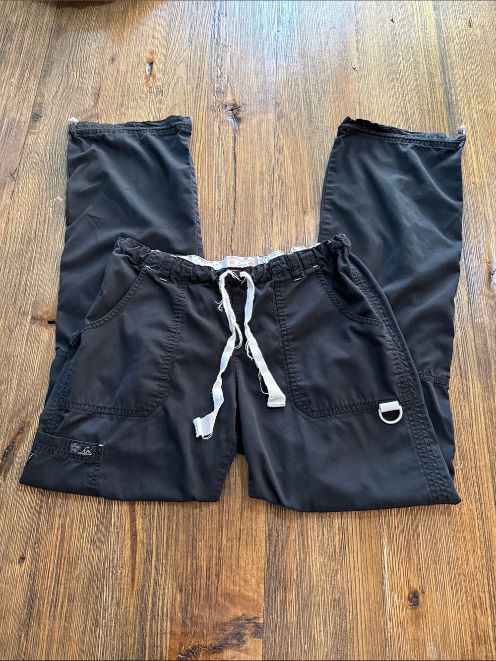 koi Black Limited Edition Scrub Pants with Floral Tab